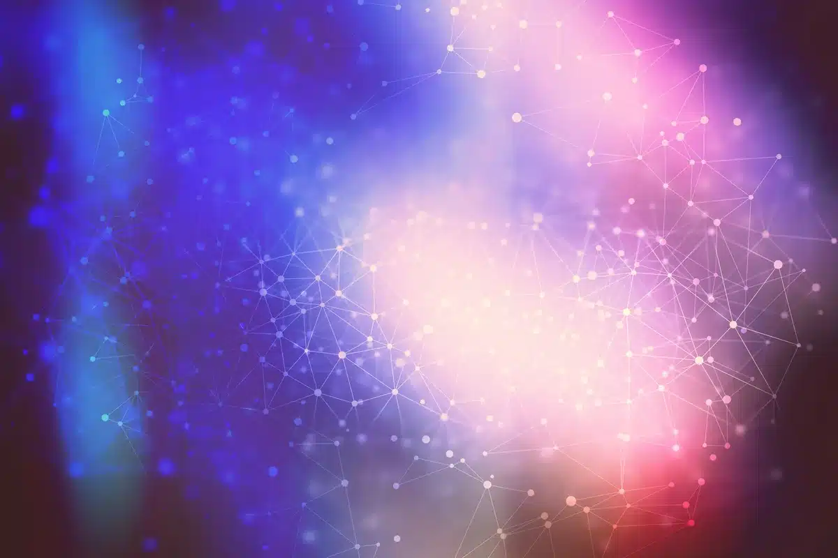 Imagen abstracta de luces azules y rosadas con una red de puntos y líneas