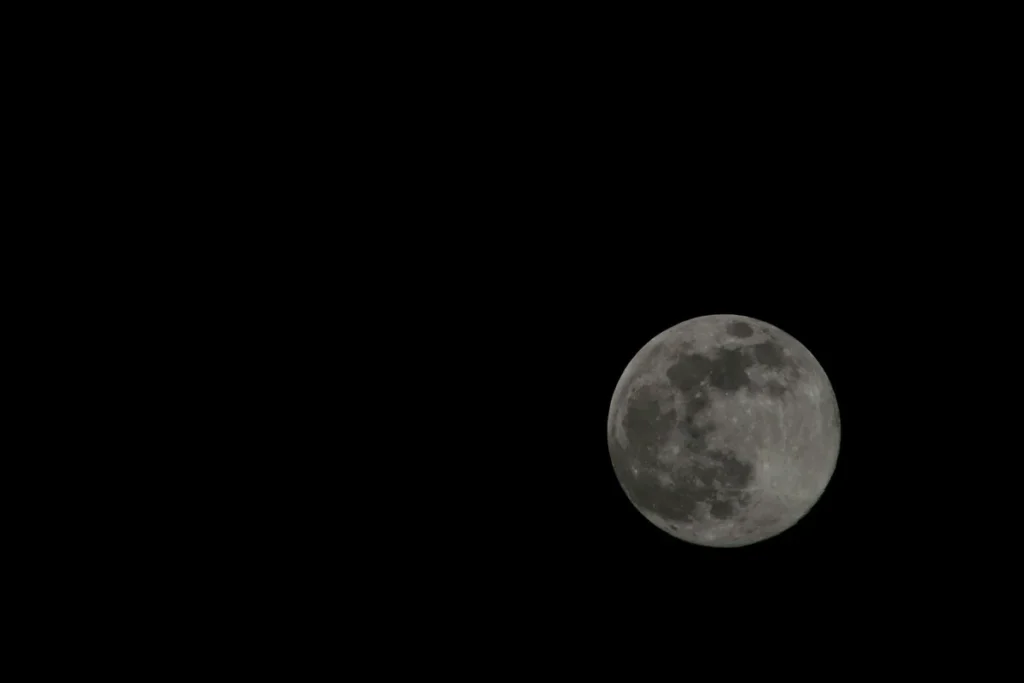 NASA Orion spacecraft approaching lunar orbit Earth background deep space